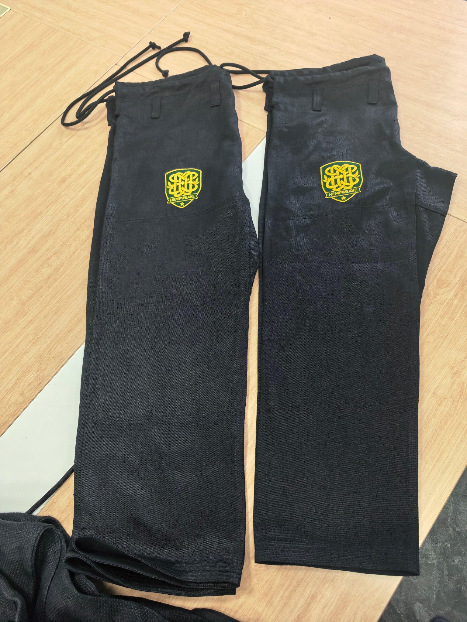 The Standard — Black pants showing thigh patch